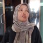 Sekretaris Disdukcapil PPU, Mawar, pada saat kegiatan rapat di Gedung Paripurna DPRD PPU. (Dok : CahayaBorneo/AJI)